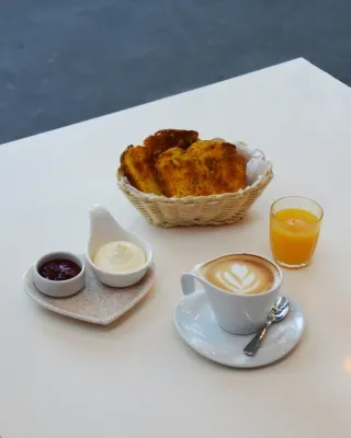 Logo de MUNAY Cafetería y Pastelería