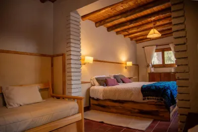 Logo de Cabañas "Potre, Casas de Montaña"