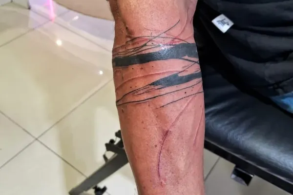 Luigi Gross - Tatuajes y piercings